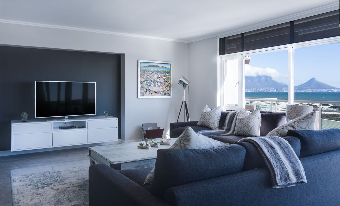 Quiet interior with warm natural finishes, illustrating the room concept